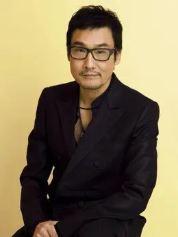 狄文杰（梁家辉饰演）